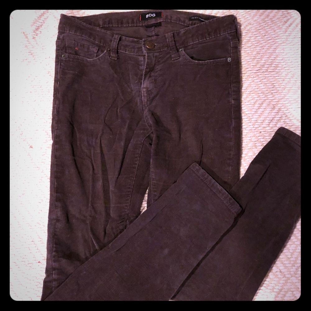 Purple corduroy skinny pants.